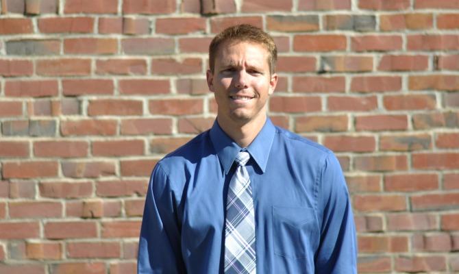 Para-educator and substitute guidance counselo, Clay Stiver, hopes to bring positivity and victory to the Junior Varsity boys basketball team.