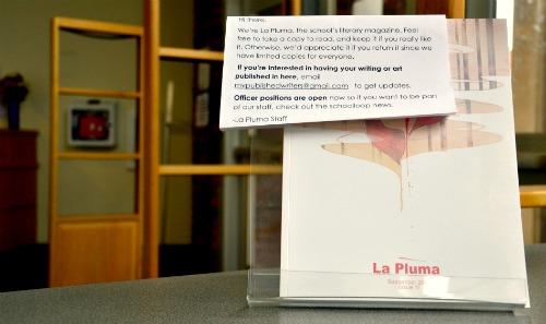 The current issue of La Pluma was distributed at the beginning of the 2011-2012 school year. The cover design and pages were all designed by senior Helen Han. Photo by Stephanie Chang.