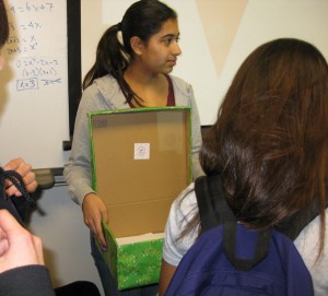 At Interact’s Dec. 1 meeting, members lined up to write and drop-off letters into a box wrapped in festive green wrapping paper. For every letter Interact receives, Macy’s will donate $1 to the Make-A-Wish Foundation. Photo by Nona Penner.