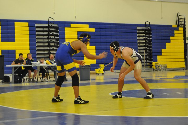 Senior Michael Whittaker faces off with his opponent from Santa Clara at the Jan. 12 wrestling match against the Bruins. Whittaker contributed one of 8 pins that propelled the Matadors to victory against their opponents. Photo by Howard Lee. 