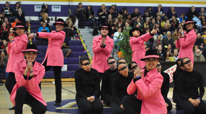 Striking their ending pose, the Marquesas perform their last routine of the night, a character routine inspired by “The Pink Panther.” Their Character routine placed fourth out of eight teams. Photo by Angela Liu.