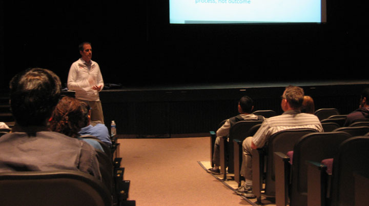 Steve Portenga, the lead sports psychologist for USA’s Olympic track team, speaks to MVHS track athletes and parents on May 1. Portenga, who was invited by MVHS track coach Kirk Flatow, explained the mental aspects of running. Photo by Carissa Chan.