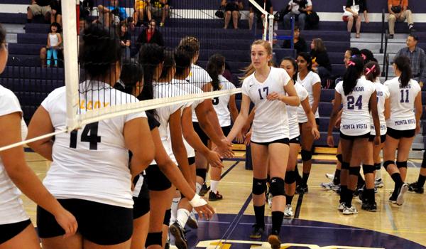 After the match, MVHS volleyball players shake hands with the WHS Chargers. The Matadors won the match 3-0 on Sept. 5. Photo by Margaret Lin.