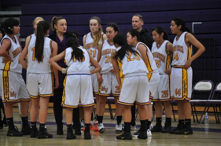 Coach Sara Borelli gives the Lady Mats a pep talk during half time, when they were trailing the Saratoga Falcons. Photo by Catherine Lockwood.