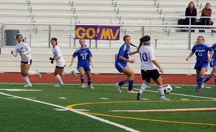 Junior Angela Inn makes her way over to Los Altos High Schools territory, only to be met with opposition from LAHSs powerful defense on Jan. 11. In situations like this, the Lady Mats failed to maintain possession of the ball, which in part prevented MVHS from scoring and led to their 0-2 loss. Photo by Soumya Kurnool.