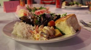  Each attendee received a full plate of food which included grilled meats, salad and grains. Drinks were also offered and the dessert was a slice of marble cake. Photo courtesy of Preston Yeung.