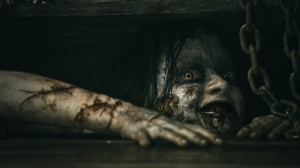 Mia, possessed by an ancient evil, attempts to escape her capture in a basement. “Evil Dead” shows new direction and takes a step away from the 1981 original, with new cast and a tremendous amount of pure terror. Source: Ghosthouse Pictures