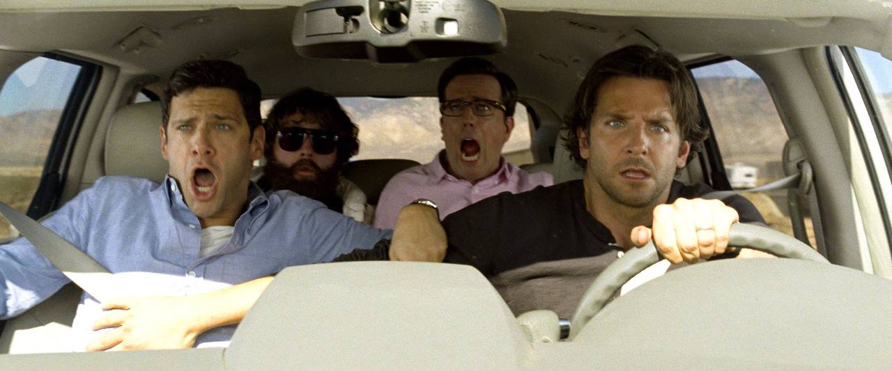 Phil (Bradley Cooper), Stu (Ed Helms), Douglas (Justin Bartha) and  Alan (Zach Galifianakis) are on the way to a rehabilitation center before they are kidnapped. They are in a car chase. 