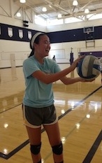 Co-captain senior Beverly Yu prepares to serve the ball during a practice game at tryouts. Tryouts ended on Wed. Aug 21. Photo by Manasa Sanka.