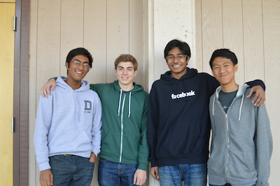 Sophomore Ajay Jain, seniors Michael Mattheakis and Zuhayeer Musa and sophomore Jimmy Liu (from left to right) won the Disrupt SF Hackathon 2013 last month. The boys created an app called Spruce, which allows users quick access to definitions while reading a book from its online library. Photo by Ashish Samaddar.