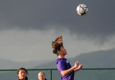 Soccer player tries to overcome obstacle