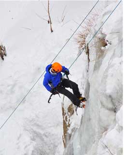 Junior ice climbs during the Ouray Ice Festival in Colorado