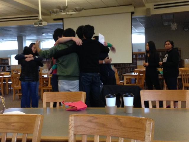 Members hug after playing cross the line. Photo by Elia Chen.