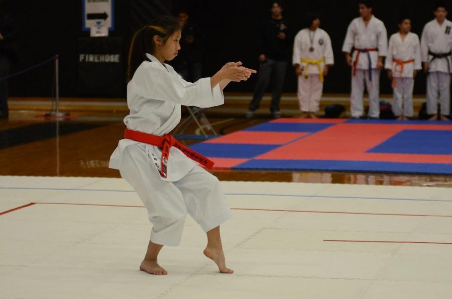 STAND READY Kaneda performs the unsu kata at the 2012 Regional Championships. Unsu is one of the most advanced katas. 