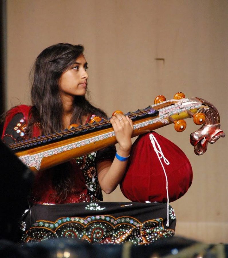 Senior Anna Aswadathi performs for the show in May 2013. Photo used with permission by Tanaya Sawant. 