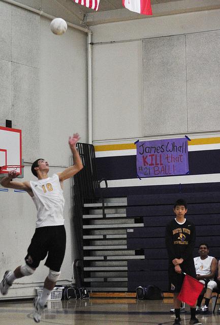 Then-Junior Ryan Manley gets ready to spike the ball against Los Gatos High School. Manley enjoys volleyball more than football, in part because he discovered and became good at the sport in middle school within two years. Photo by Cynthia Mao