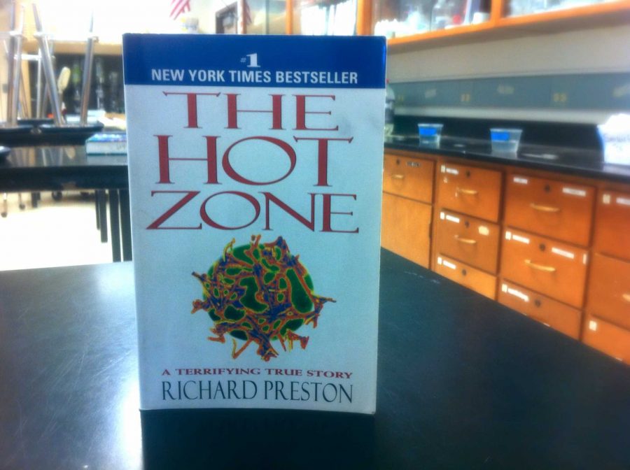 Andrew Goldenkranz uses the book The Hot Zone as a basis for his study guide. This book discusses the emergence of the Ebola virus that correlates to the curriculum performed in Goldenkranz AP Environmental Science course. Photo by Aditi Desai
