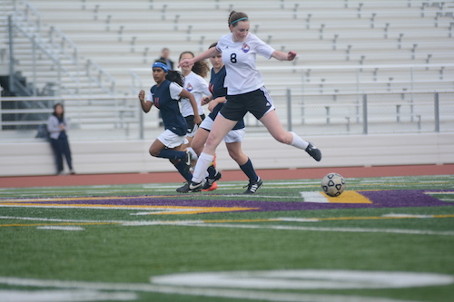 Junior Alissa Paterson dribbles the ball down the field during the game against Lynbrook High School on Jan. 15. With a final score of 1-0, the game was the teams first league win. Photo by Justin Kim.