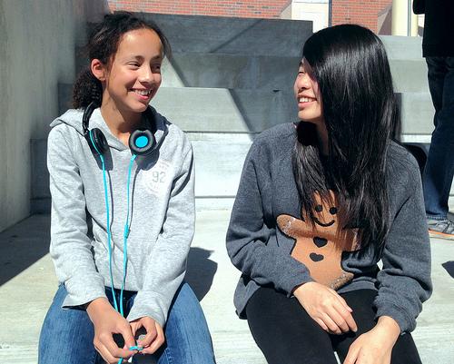  Freshmen Mel Hauradou and Amber Hu sit on the stairs during lunch on Feb. 24. Photo by Avni Prasad