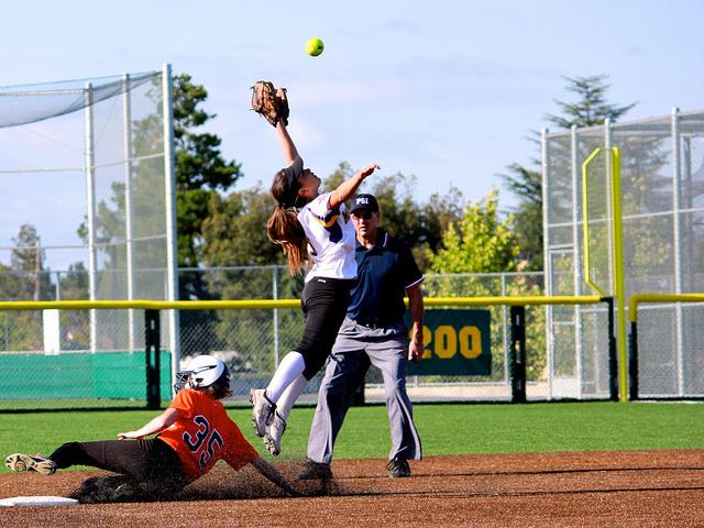 Sophomore Danielle Koontz leaps in to the air to catch a Los Gatos High School ball on May 20. Though the game was highlighted by strong MVHS catching, the team fell 9-3 to the Wildcats, severing their chances at a CCS championship. Photo by Justin Kim