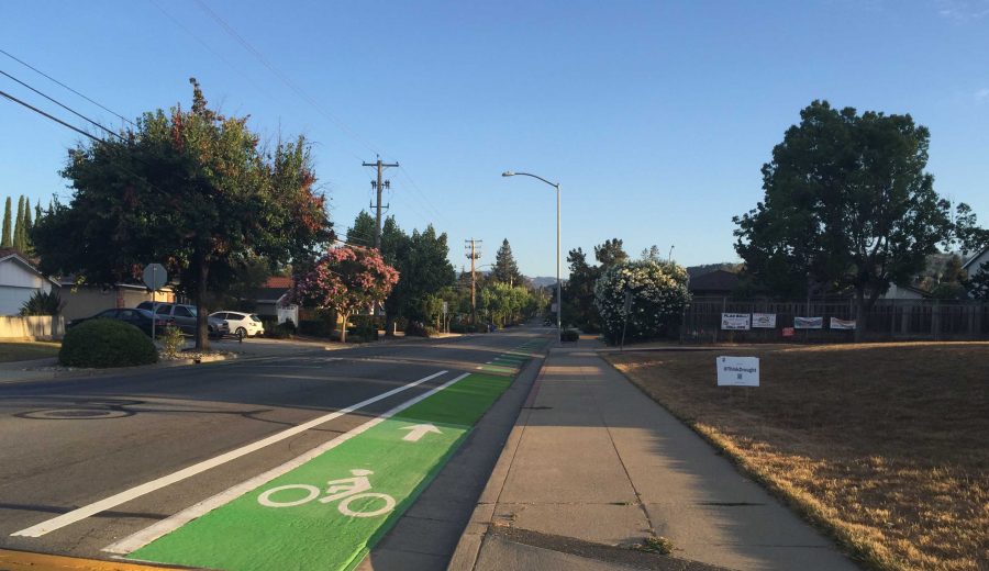 The newly painted bike lane stretches across Bubb Road in front of Kennedy Middle School. A multitude of students bike across this lane daily to get to and from school. (Photo by Elizabeth Han.)
