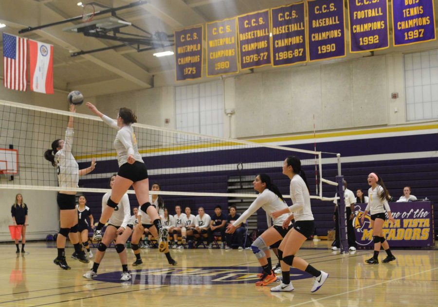 Junior Ellie Cary goes up for a hit from outside in the second set. With 17 total kills in the match, Carys offense was key to MVHS success in the match. Photo by Malini Ramaiyer 