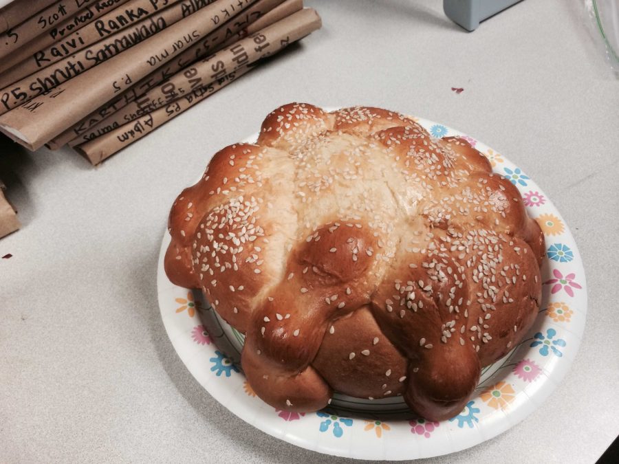 Pan de Muertos is a sweet bread eaten on special occasion in Latin America. Spanish Honor Society students celebrated Dia de los Muertos with this bread. Photo by Aditya Krishnan.