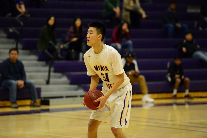 Senior Andrew Ding prepares to take a shot against Westmoor Rams. Early on, the Rams prevented the Matadors bigs, including Ding, from making an impact on the game. Photo by Pranav Iyer