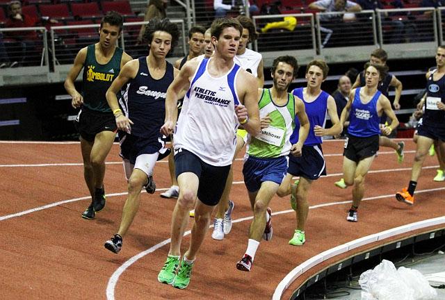 Kevin Bishop runs leads the pack during an indoor state track meet. Photo used with permission of the Cary Bishop.