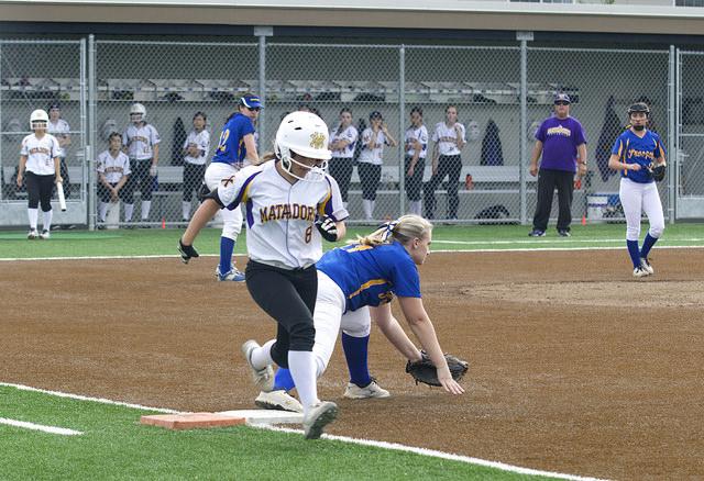 Sophomore Aly Olkein runs past first base. 