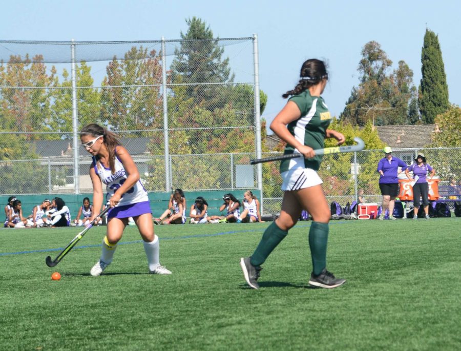 Senior captain Danielle Koontz hits the ball up the field to teammates located on the opposing half. With Live Oak HS attacking aggressively, Koontz had to pass the ball rather quickly.