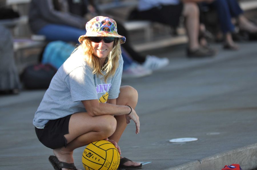 Both sides of the pool: Girls water polo coach balances the responsibility of coaching two teams at once