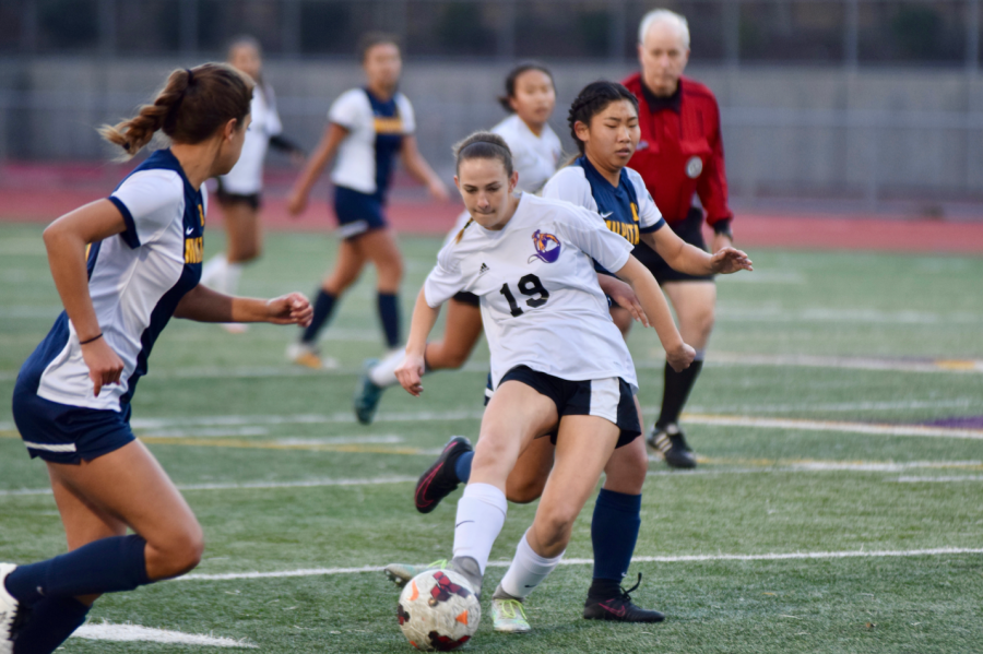 Freshman Claire Ettinger passes the ball to a teammate during a game against Milpitas HS. 