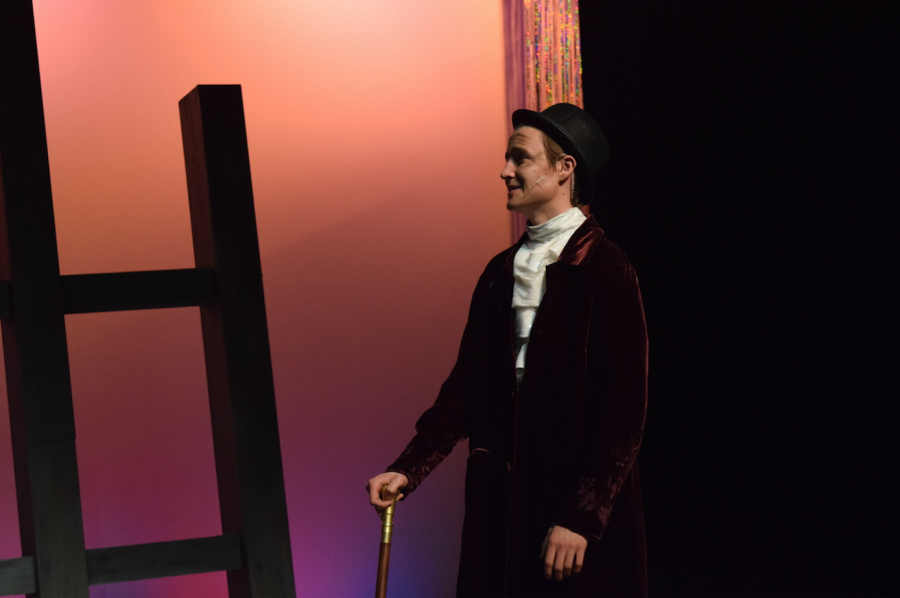 Senior Ben Pribe looks over at senior Jeremi Kalkowski in a scene of the Little Mermaid, the musical this past spring. Pribe played Grimsby, a character that oversaw and mentored Prince Eric, Kalkowski’s character. PHOTO | ILENA PENG
