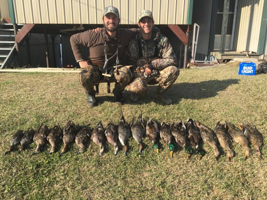 ONeill poses with his uncle after a successful duck hunting trip in Ville Platte, Louisiana. The pair reached the maximum number of ducks to hunt: 18.