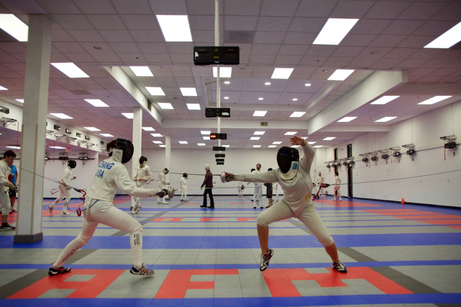 Sisters in arms: Anika and Aditi Soin participate in competitive fencing