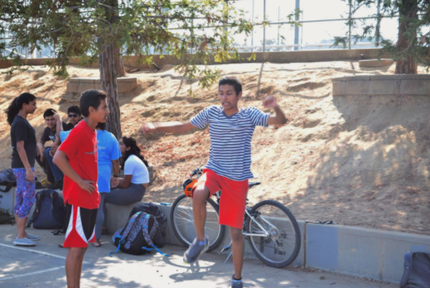 Freshmen Krish and Kanishka Kumar practice new choreography. The team split into pairs during their Friday meeting. 