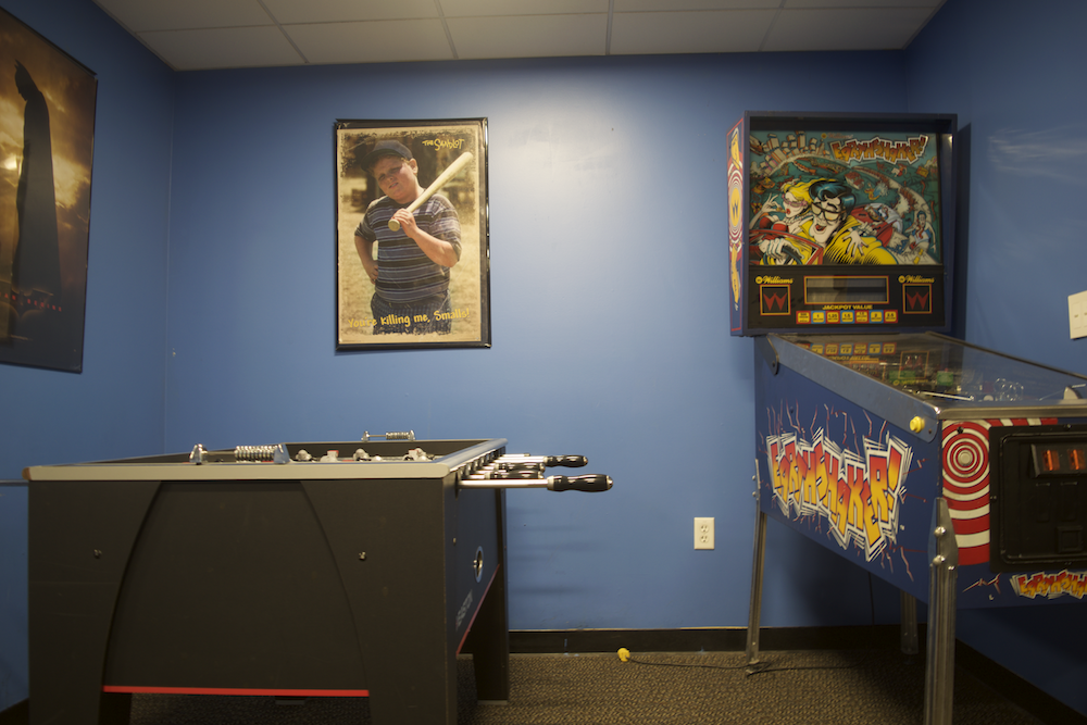 Among other activities, the Teen Center offers foosball and 1990s-based video game, called Earth Shaker. Photo by Sunjin Chang.