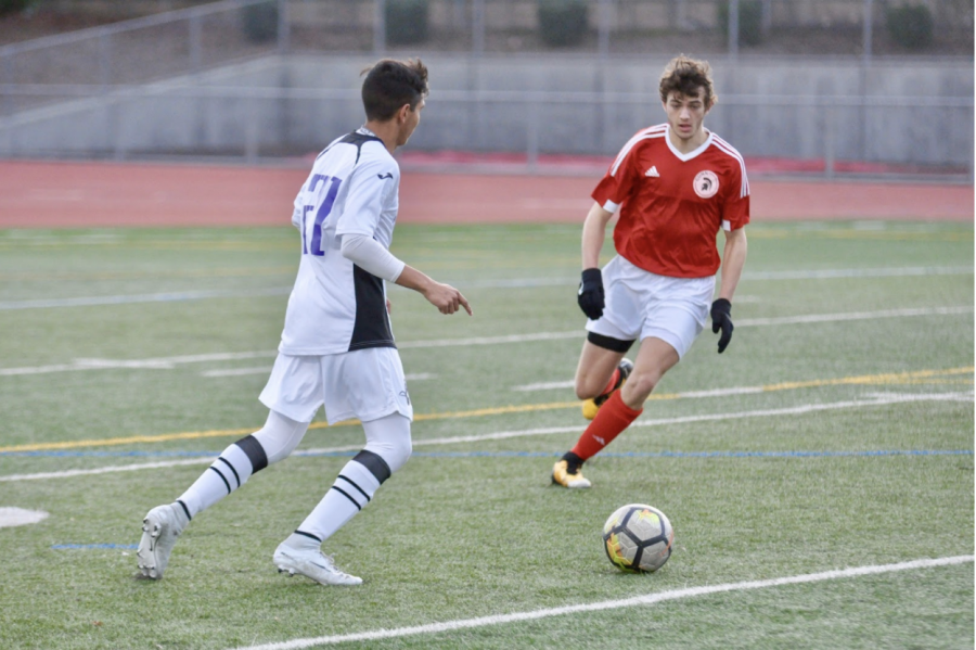 Senior+Arjun+Mathur+dribbles+in+front+of+a+GHS+defender.+GHS+stopped+MVHS+from+scoring+any+goals+in+this+game.+