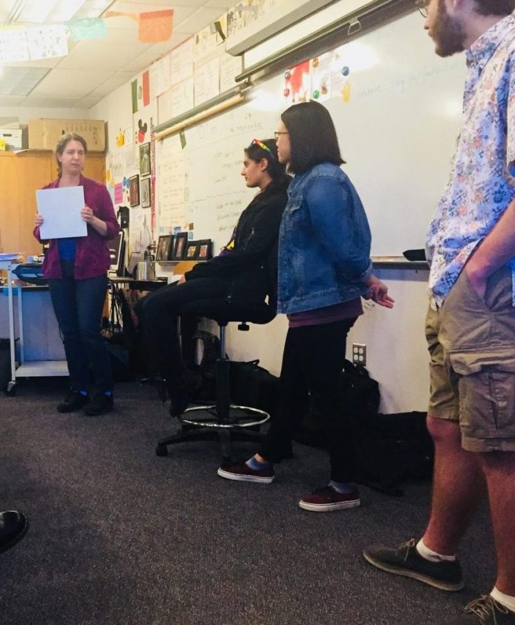 Spanish teacher Joyce Fortune, advisor, and club officers Maya Tate, Natasha Lee, and Stephen Migdal (left to right) talk about their plans for National Coming Out Day on October 5th, hosted by the Gender Sexuality and Alliance club. Photo by Dhruvika Randad.