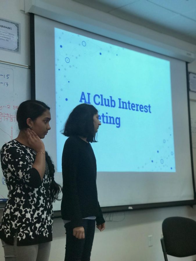 Sophomores+and+club+representatives+Eesha+Ramkumar+%28left%29+and+Ria+Doshi+%28right%29+prepare+to+give+a+presentation+on+what+AI+%28artificial+intelligence%29+club+has+to+offer.+