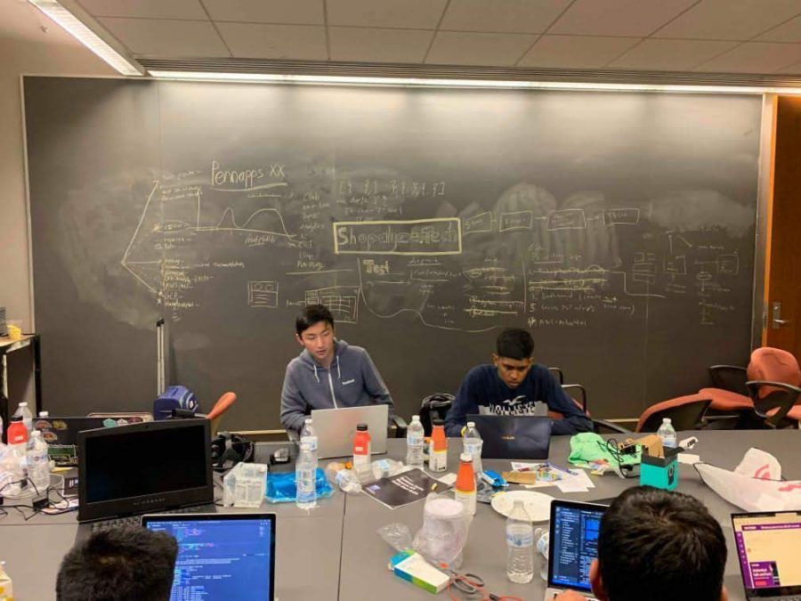 Gautham Raghupathi and Tom Zhang work on their machine learning project for a hackathon at the University of Pennsylvania. PHOTO BY RAGHUPATHI // USED WITH PERMISSION