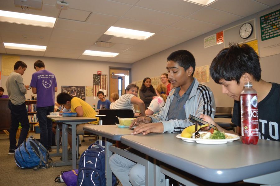 Members of Dungeons and Dragons Club create characters and socialize during a lunch meeting.