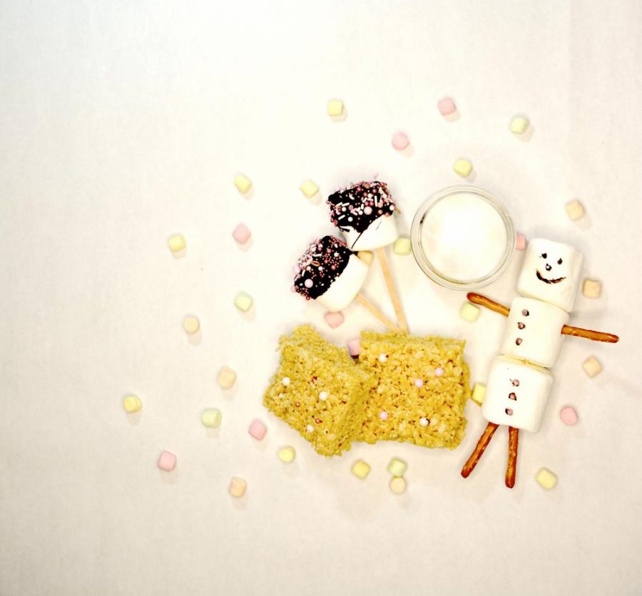 A picture of the four marshmallow creations mentioned in the story: rice krispies, marshmallow pops, marshmallow men, and a marshmallow based face mask.