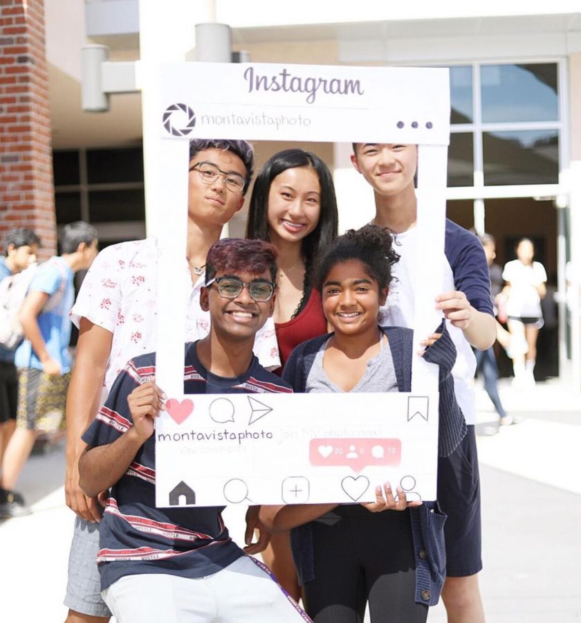 The 2019-20 MVHS Photography Club officer team poses for a photo with a poster board template of their Instagram account. Photo courtesy of Michelle Wang