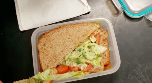 Freshman Shikhar Gupta opens his lunchbox.