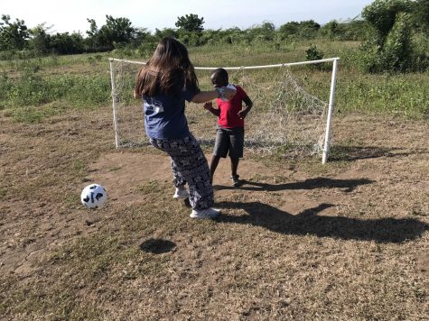 This was on the empty field behind the school where we started a game of soccer together. Photo by Emory Heath