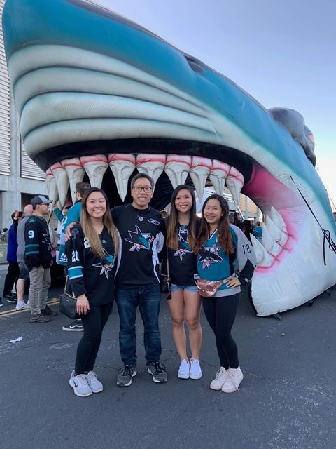 Senior Maddie Lee for the camera at a Sharks game with her family. Photo courtesy of Maddie Lee | Used with permission