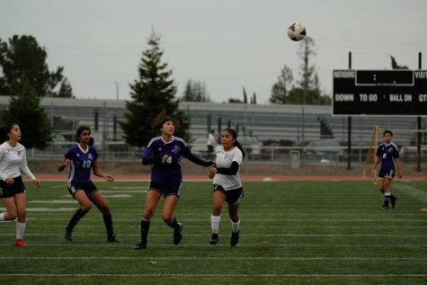 Lauren Ruckstuhl goes for a header