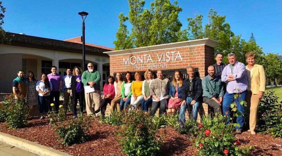 Staff members who organized Earth Deconstructed gather in front of Monta Vista High School.